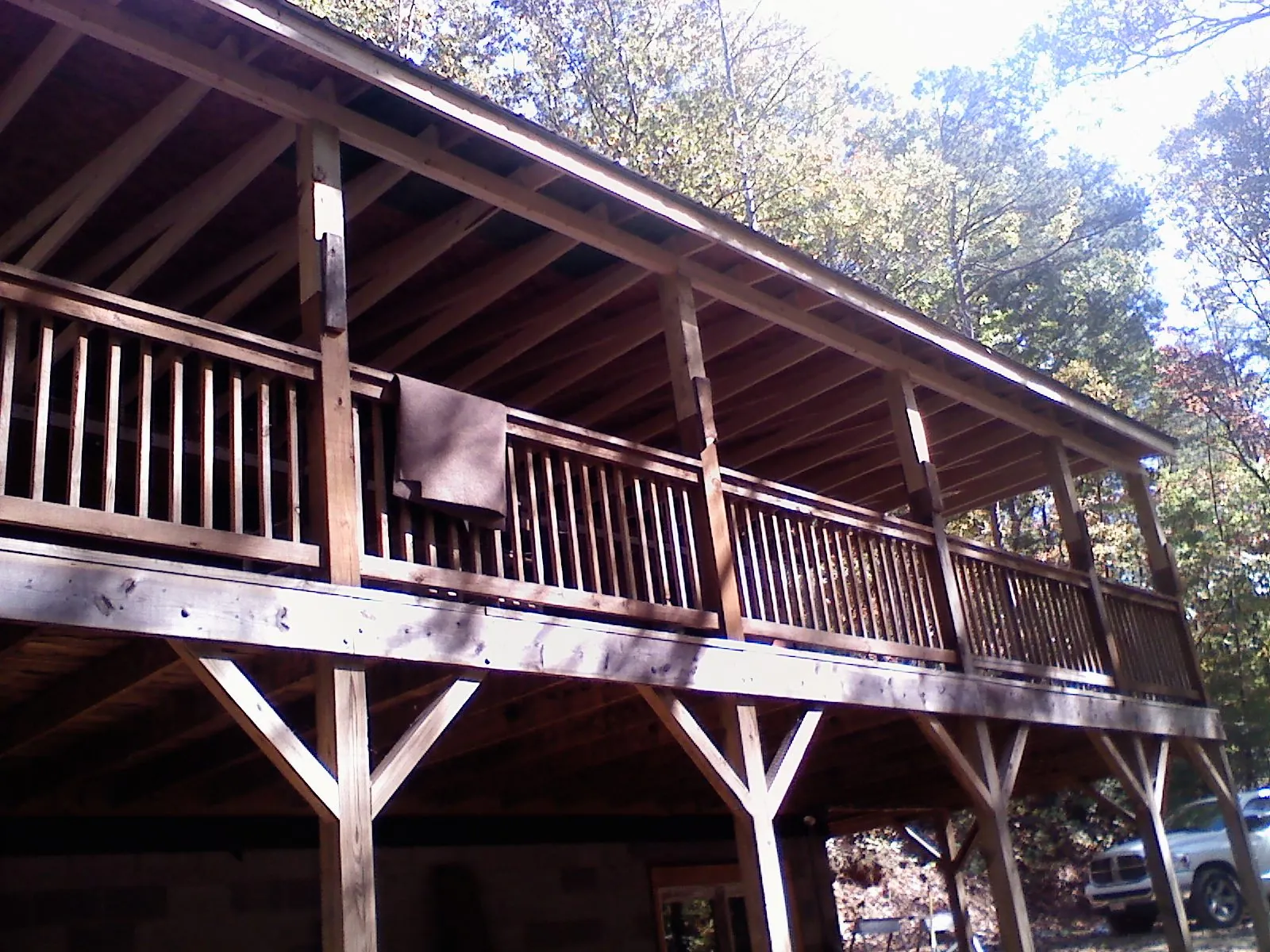 Timber framing under a new elevated porch and deck — Roof Leak Repair in Hazel Green by Roofing Brothers